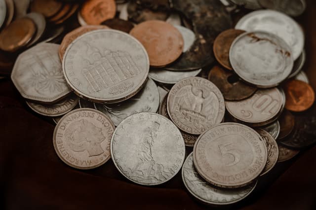 A collection of coins showing different sides