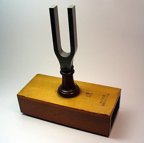 Several metal tuning forks used as reference pitches for musical tuning